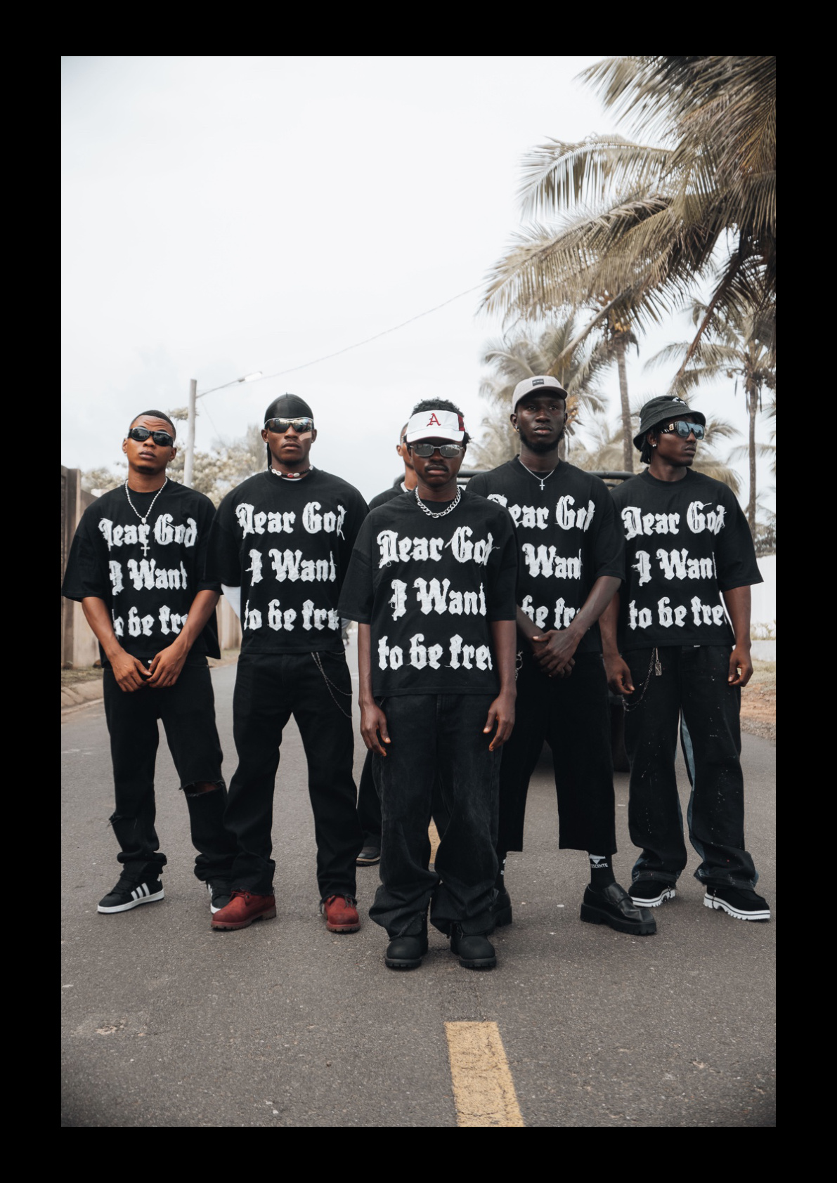 Veda Nation campaign group wearing Dear God I Want To Be Free shirts